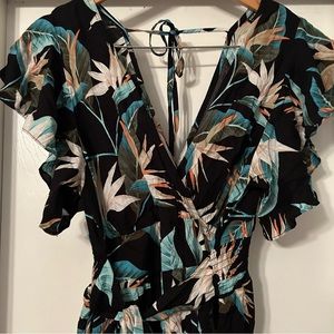 Tropical jumpsuit with bow tie waist